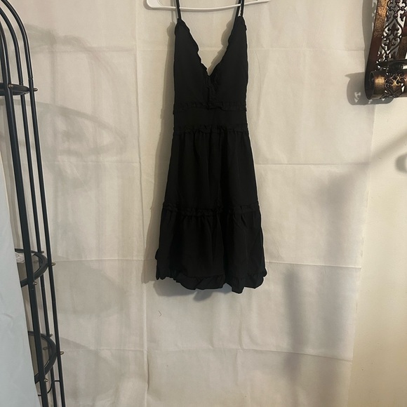 Black Dress with V Neck Ruffled Hem and Spaghetti Straps - Picture 6 of 7